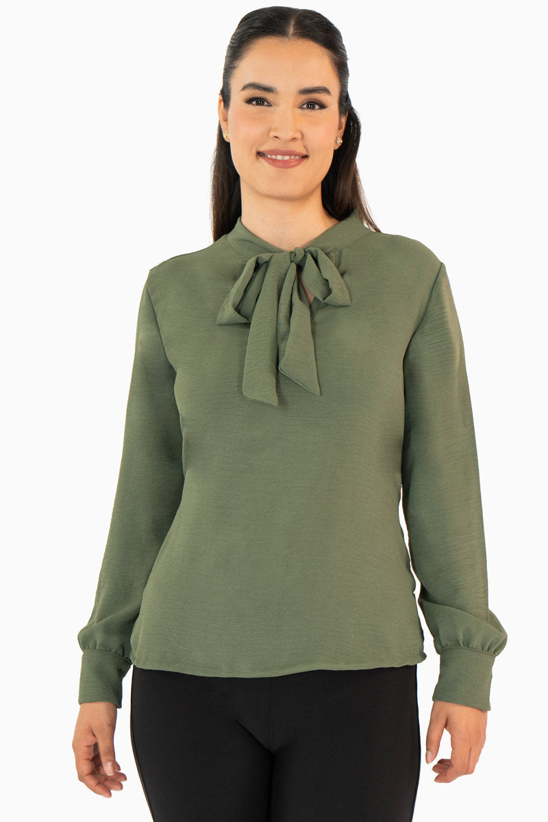 Blusa manga larga con moño en escote