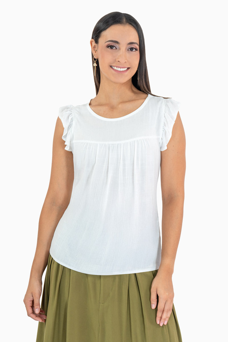 Blusa con canesú y olán en manga