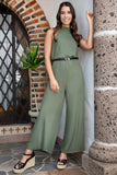 Jumpsuit halter con cinturón y escote en espalda