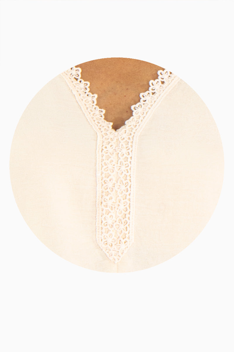 Blusa manga larga con encaje y elástico en puños