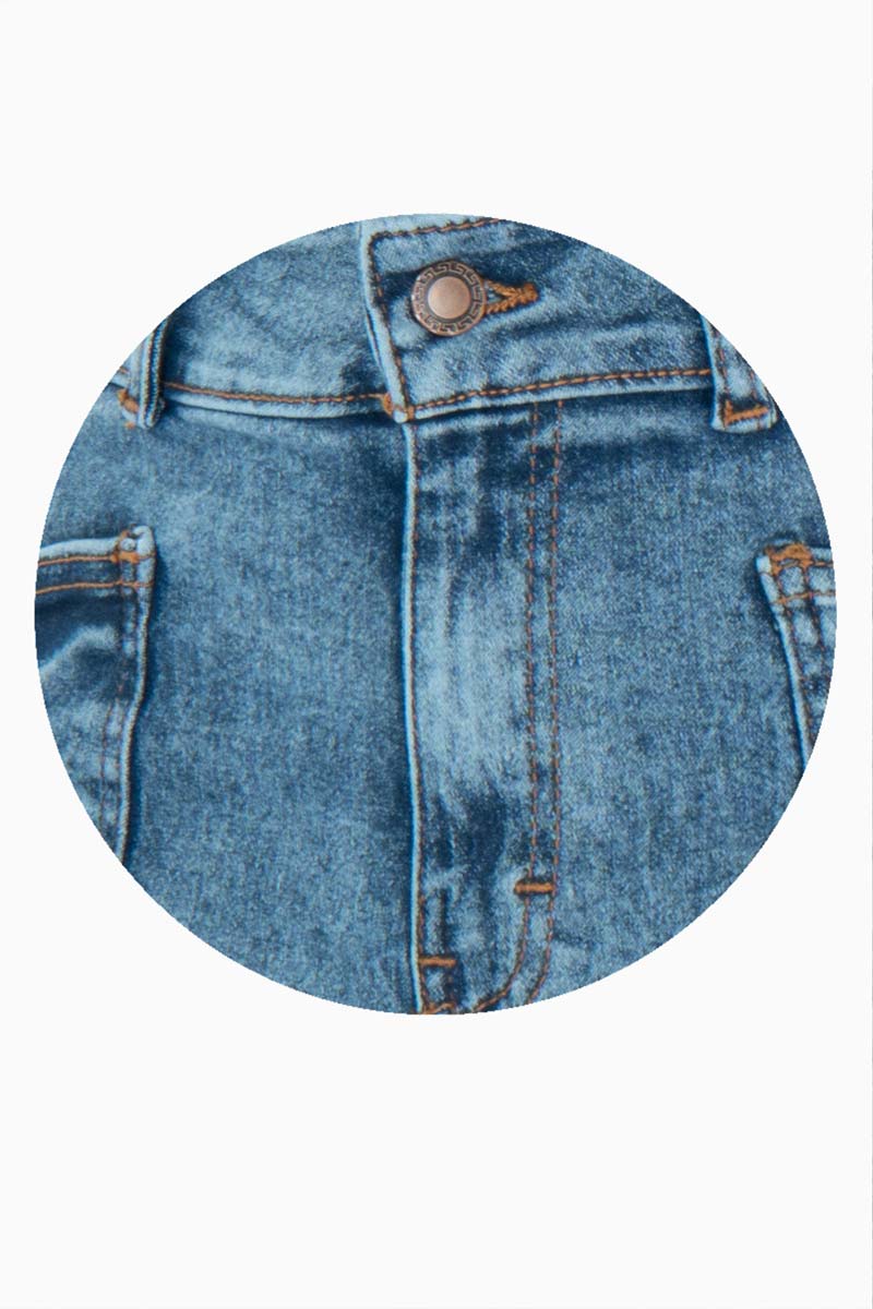 Jeans ancho con bolsas acid wash