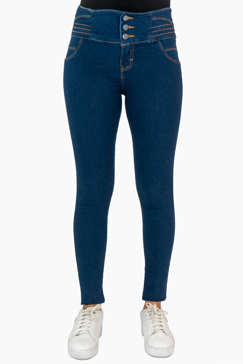 Jeans skinny con pretina ancha