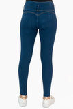 Jeans skinny con pretina ancha