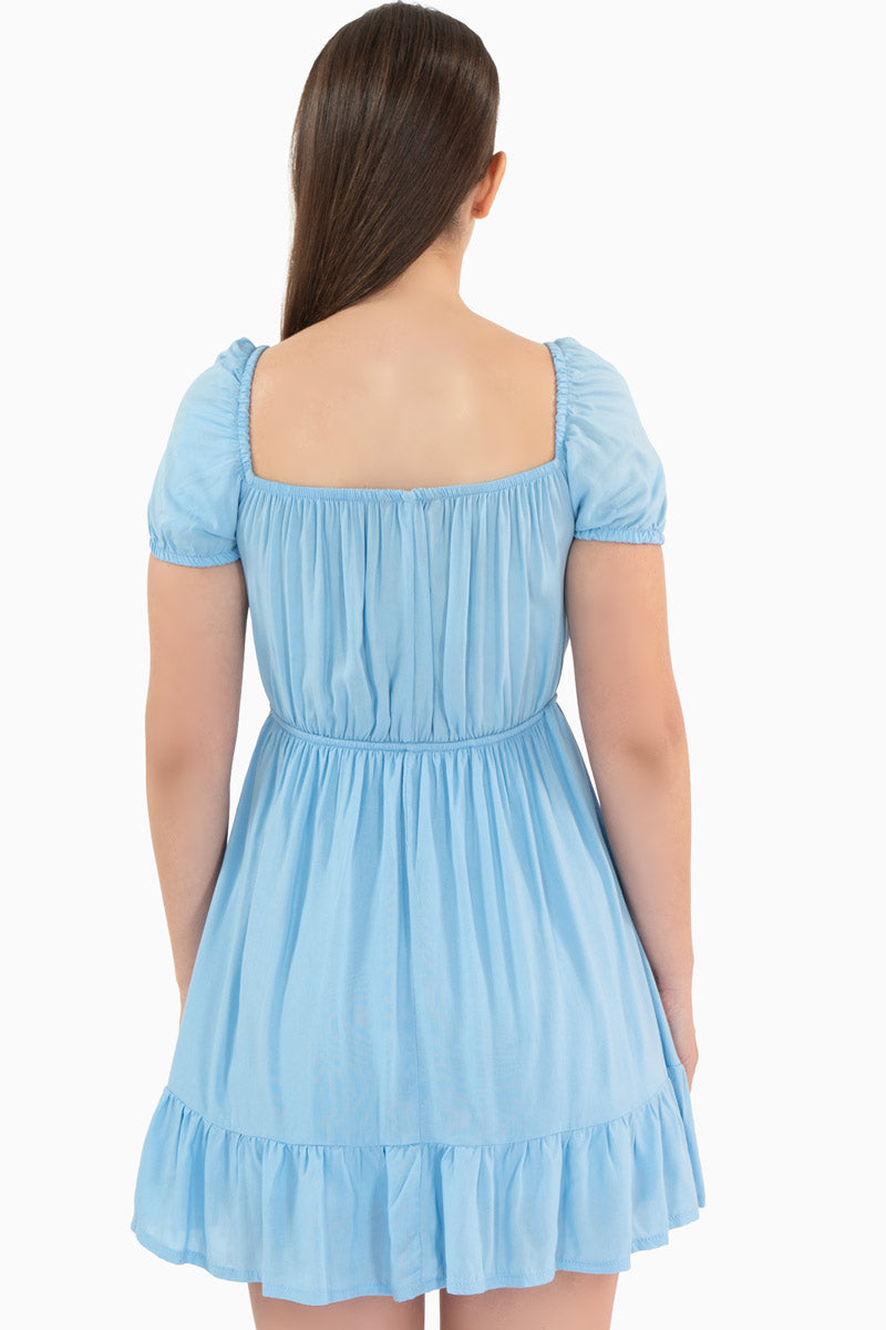 Vestido con botones y manga abullonada