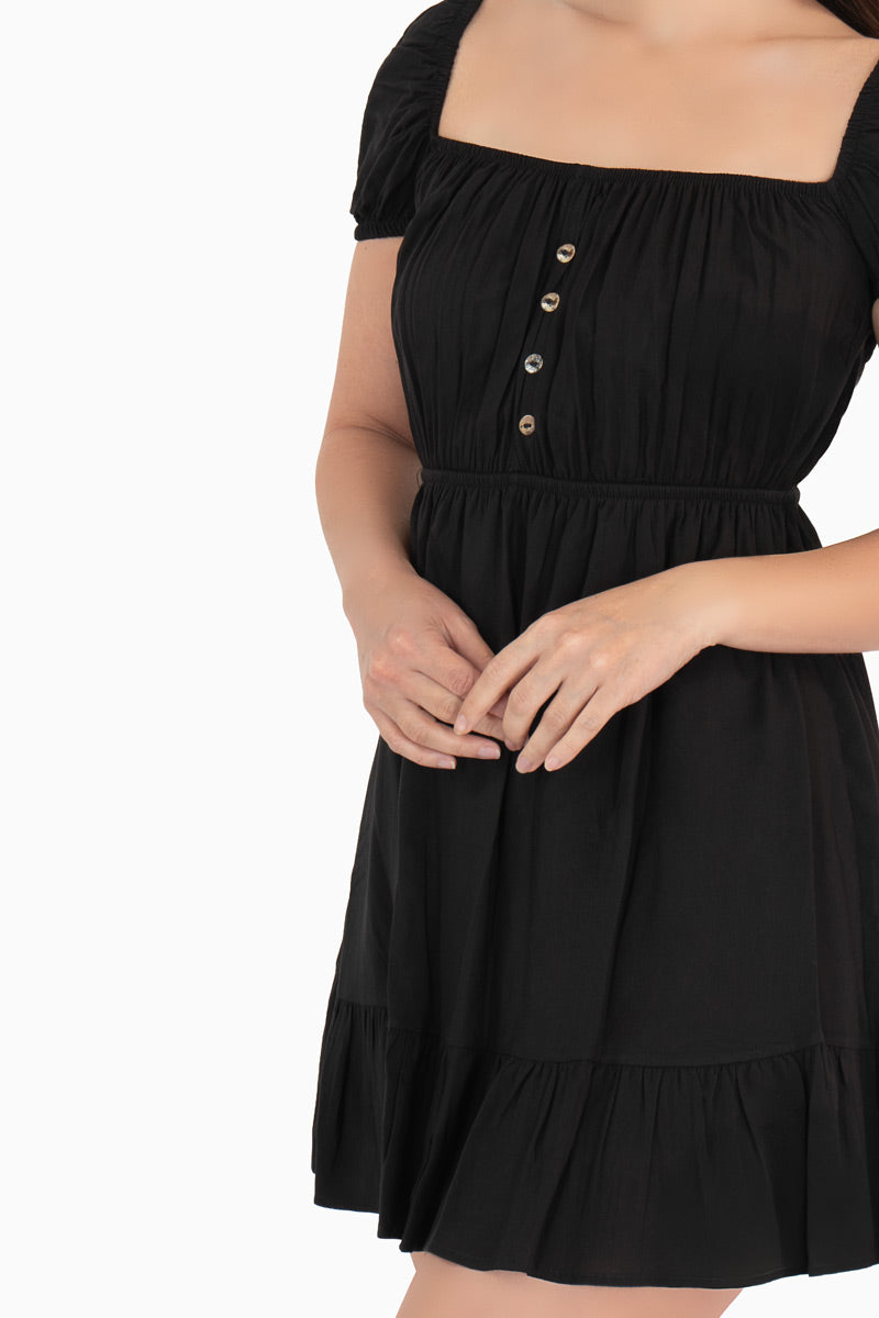 Vestido con botones y manga abullonada