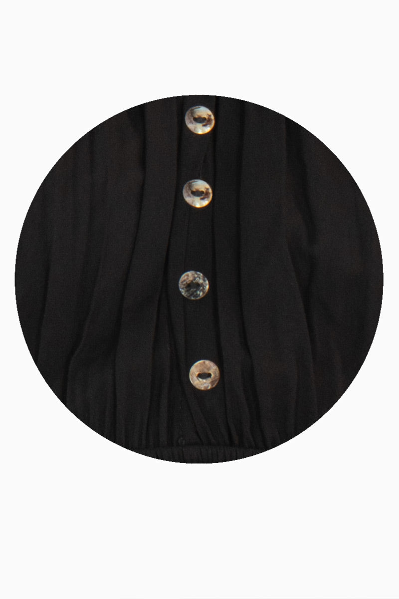 Vestido con botones y manga abullonada