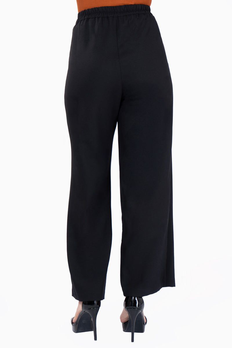 Pantalon liso pierna ancha con bolsas