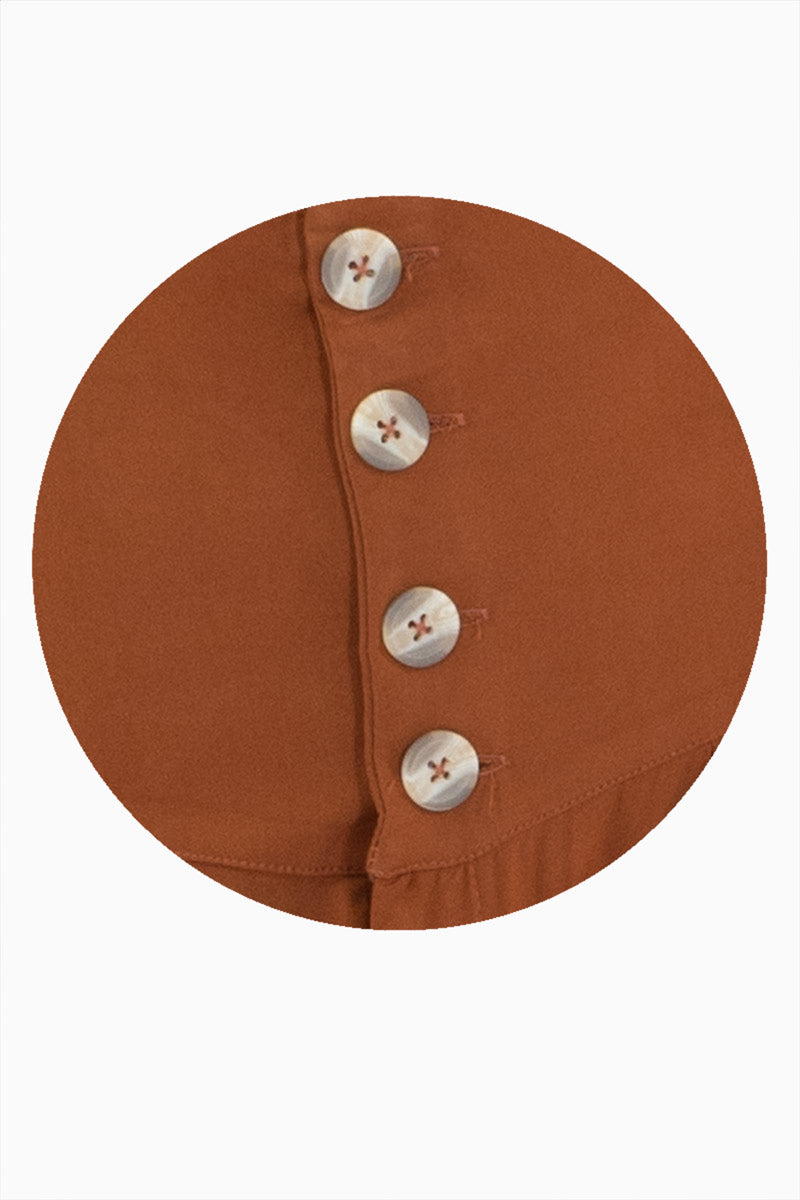 Falda maxi lisa con botones y tablones