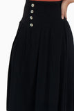 Falda maxi lisa con botones y tablones