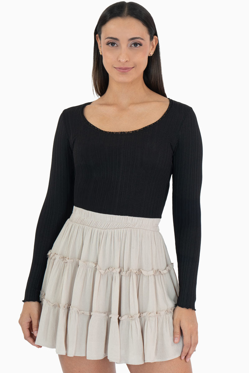 Falda corta con olanes