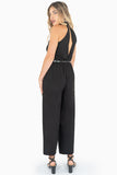 Jumpsuit halter con cinturón y escote en espalda