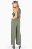 Jumpsuit halter con cinturón y escote en espalda