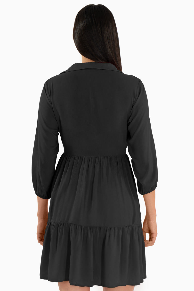 Vestido con olanes manga 3/4