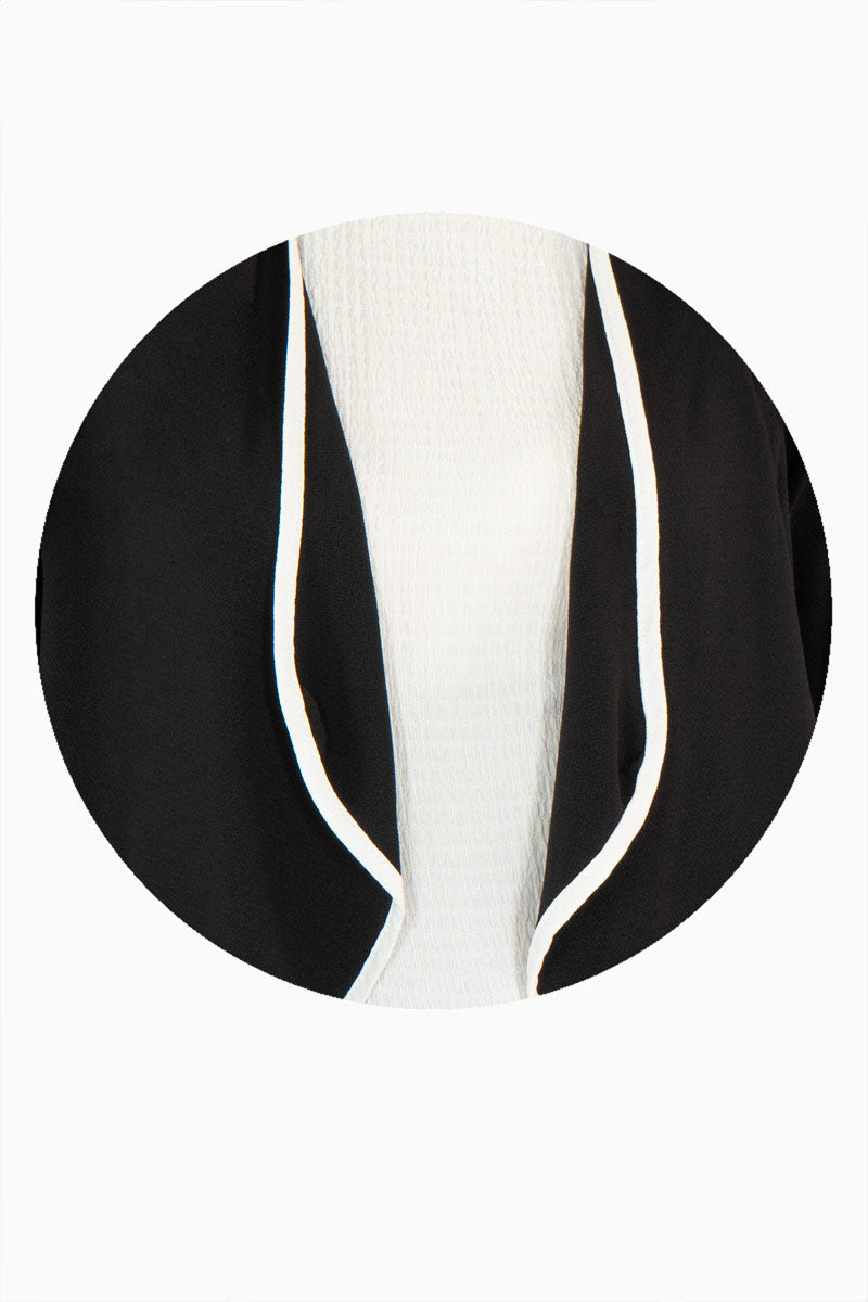 Saco ligero manga 3/4 con detalle en solapa