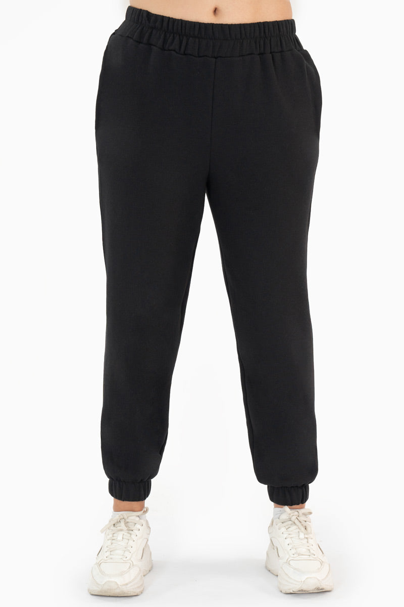 Pantalón con bolsas y elástico  en tobillos