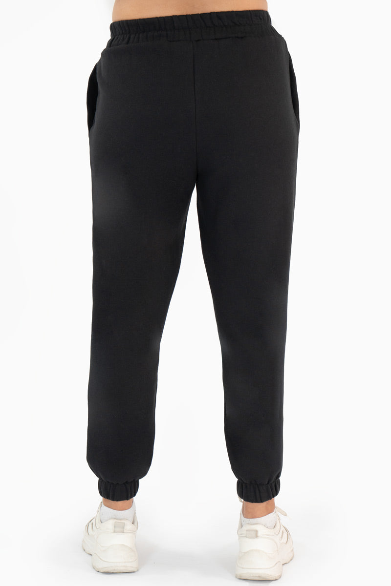 Pantalón con bolsas y elástico  en tobillos