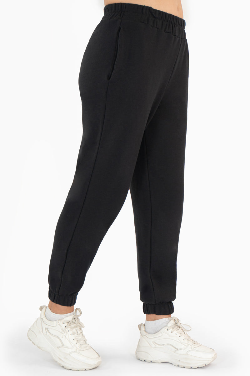 Pantalón con bolsas y elástico  en tobillos