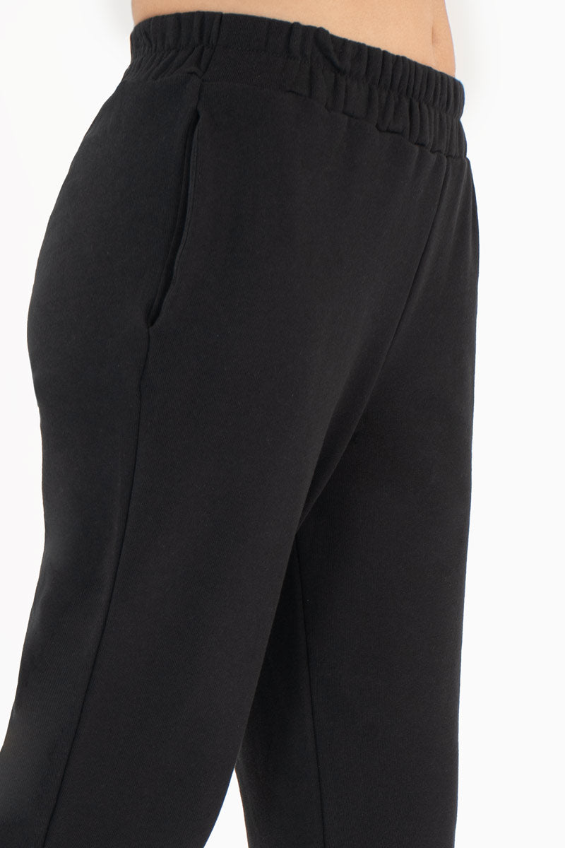 Pantalón con bolsas y elástico  en tobillos