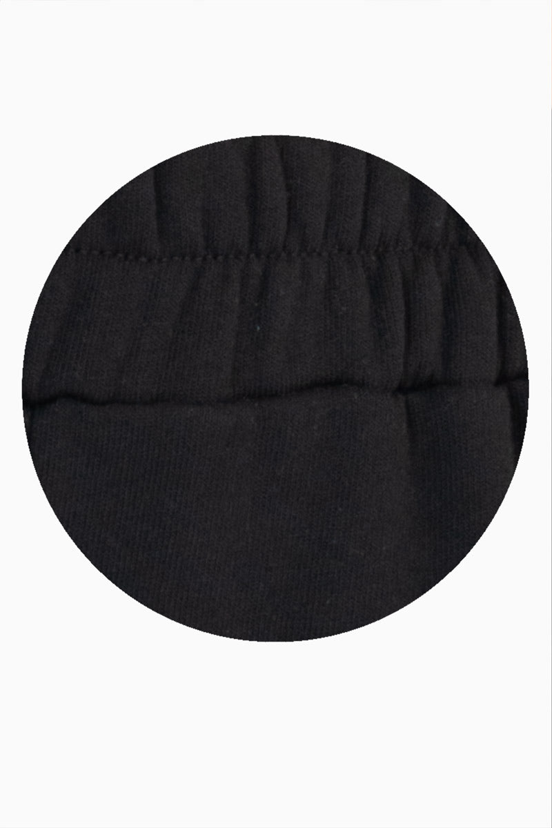 Pantalón con bolsas y elástico  en tobillos