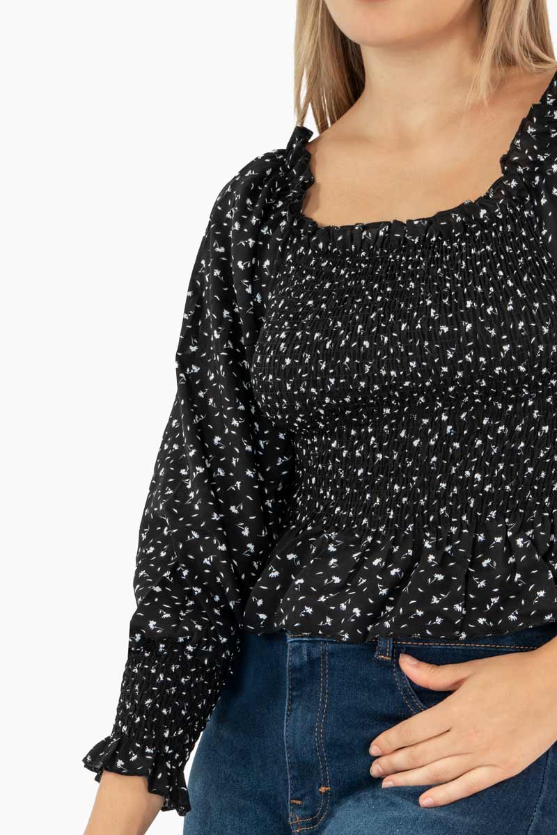 Blusa floral de manga larga y escote recto