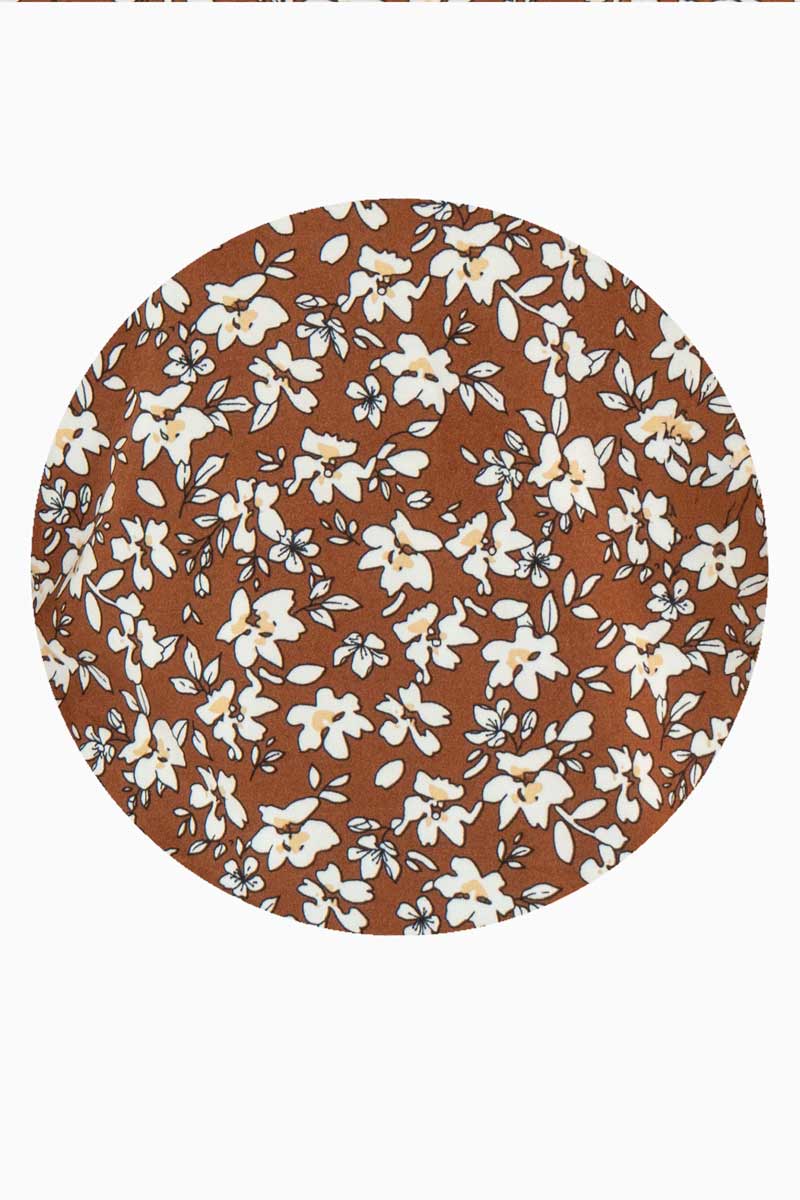 Blusa floral y mangas corta abullonadas