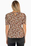 Blusa floral y mangas corta abullonadas