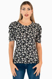 Blusa floral y mangas corta abullonadas