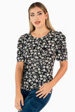 Blusa floral y mangas corta abullonadas