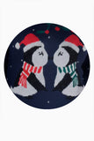 Suéter navideño con pingüinos