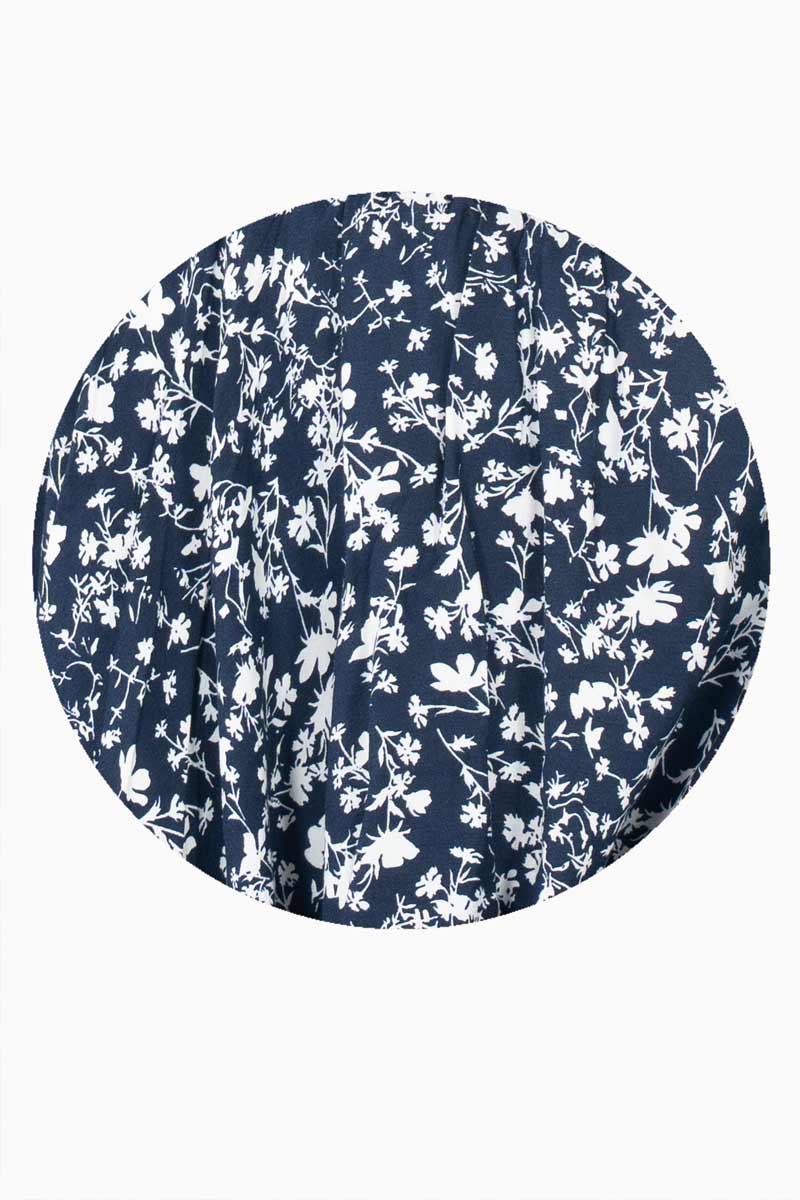 Short falda floral con cinturón