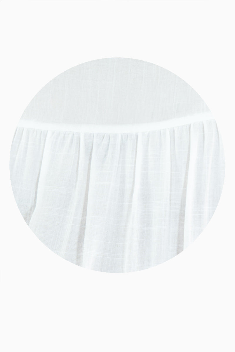 Blusa con canesú y olán en manga