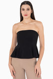 Blusa lisa strapless con peplum