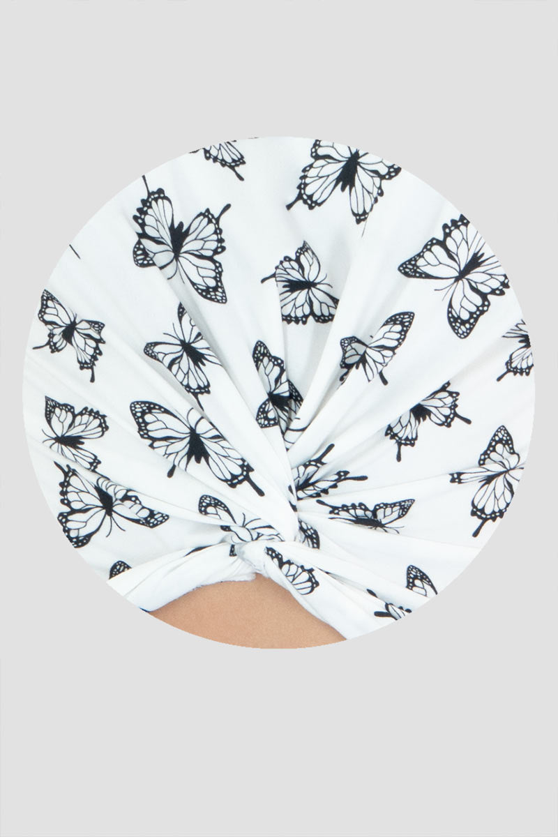 Playera sin mangas con estampado de mariposas