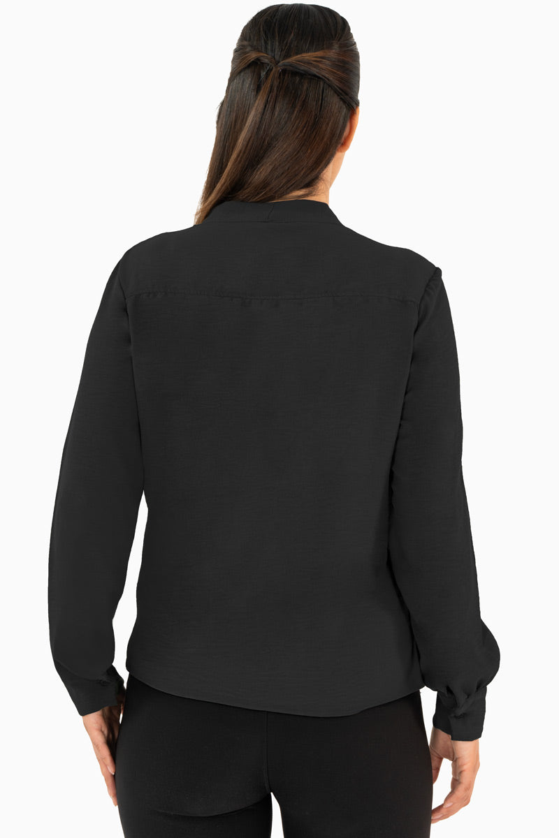 Blusa manga larga con moño en escote