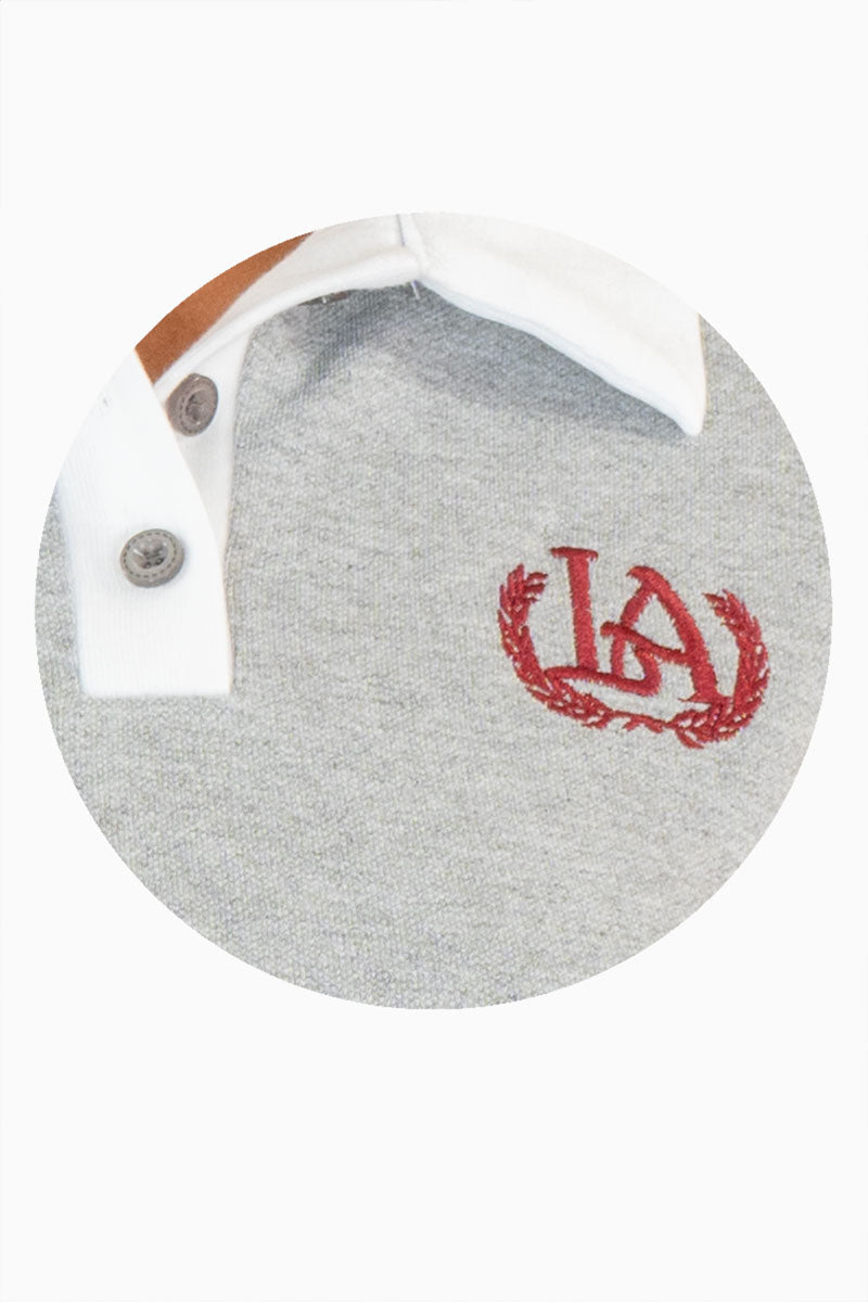 Playera polo con bordado en pecho y manga corta