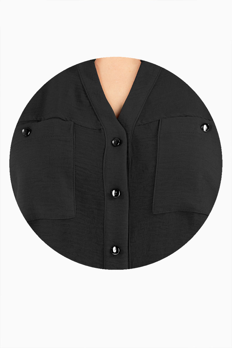 Blusa manga larga con bolsas y cuello mao