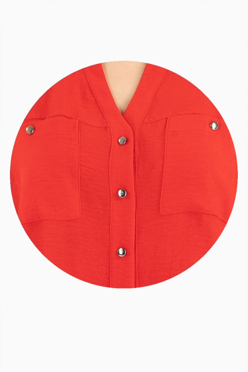 Blusa manga larga con bolsas y cuello mao