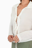 Blusa manga larga con amarres en delantero