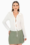 Blusa manga larga con amarres en delantero