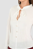 Blusa manga larga con botones y amarre