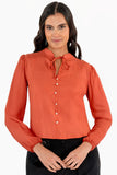 Blusa manga larga con botones y amarre