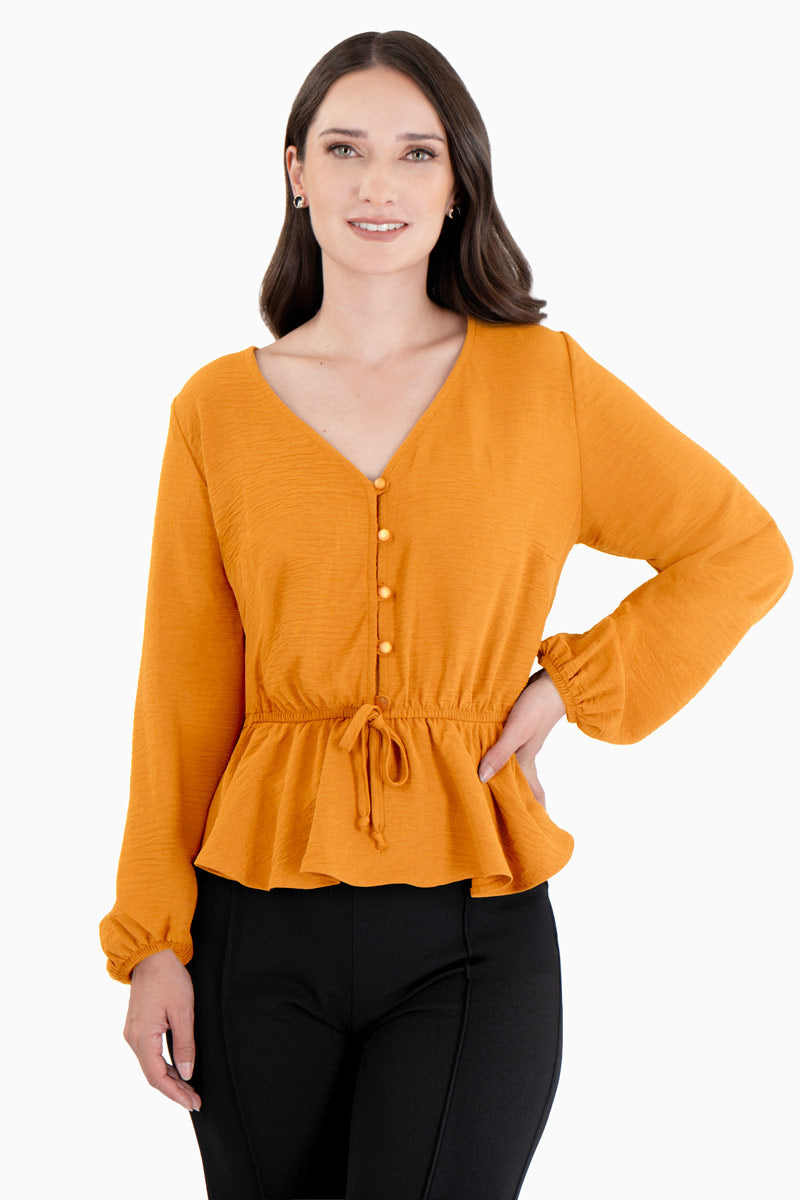 Blusa manga larga con ajuste en cintura y botones