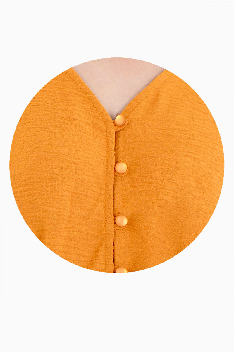 Blusa manga larga con ajuste en cintura y botones