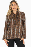 Blusa animal print manga larga y cinta en cuello