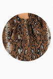 Blusa animal print manga larga y cinta en cuello