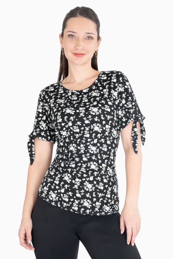 Blusa floral con amarre en mangas