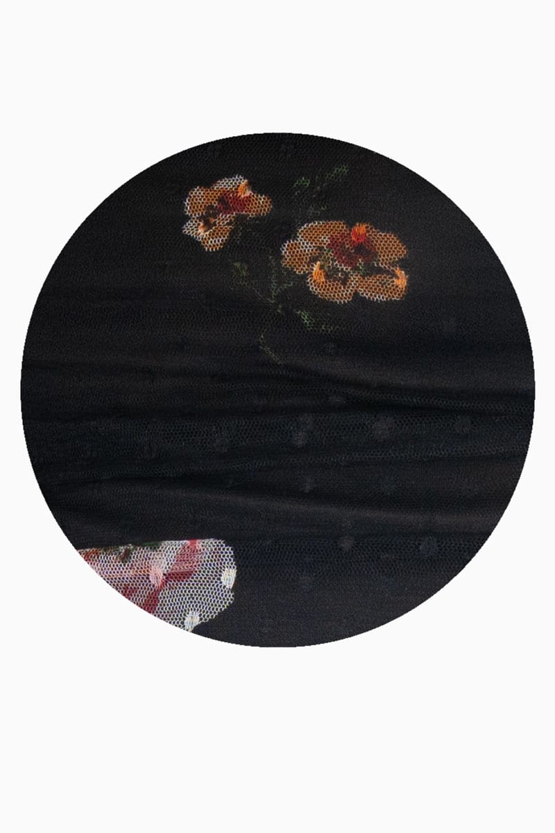 Blusa floral y manga corta con mesh