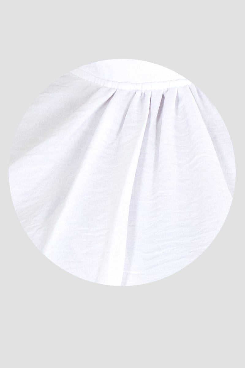 Blusa sin mangas con moño en escote