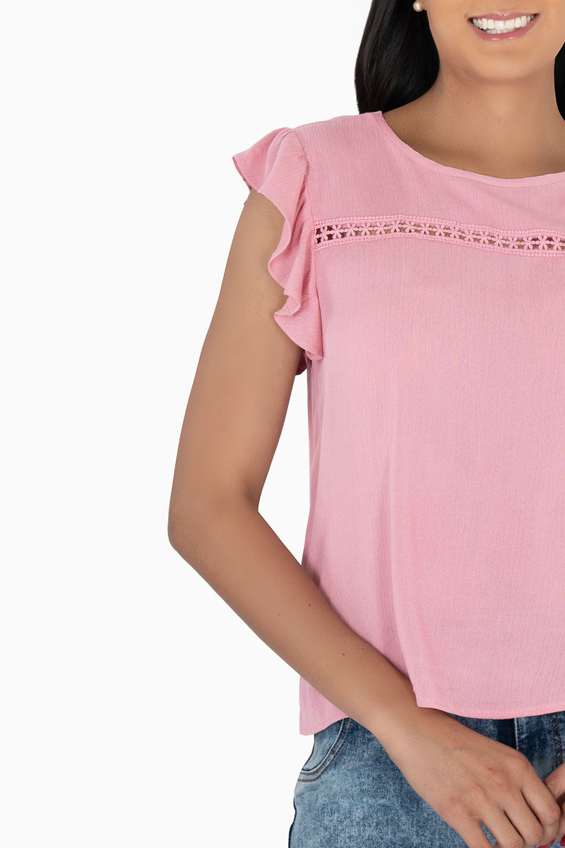 Blusa con olán en manga y tira bordada