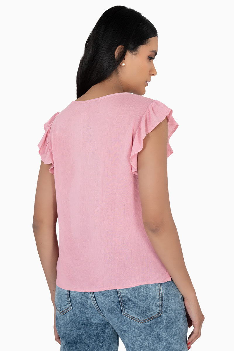 Blusa con olán en manga y tira bordada